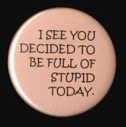 President Obama's favorite button to wear while in the company of his staff..  Courtesy of Google Image search.
